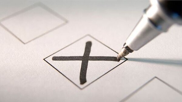 A cross in a ballot.